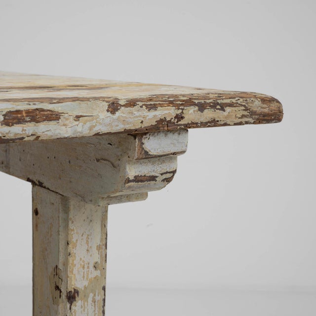 Imbued with a sense of rustic nostalgia, this early 1900s Central European wood table is a splendid artifact of simpler...