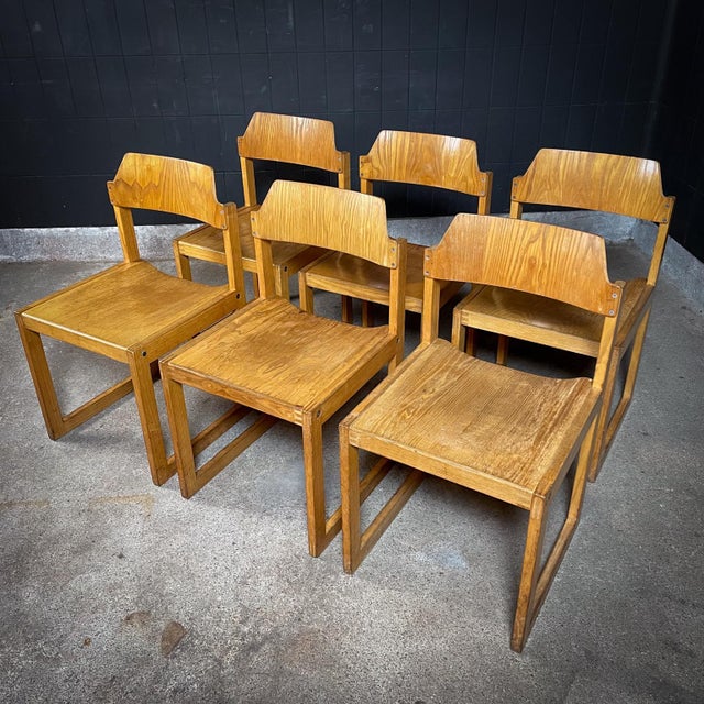 This match of 20 dining room chairs were designed in the 60s by Rainer Schell for Schlapp Möbel. The wooden seats are in...
