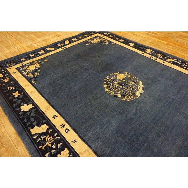 Wool Blue Antique Hand Knotted Pile Rectangle 1920s Rug, Circa Date: 1920s. This exceptional hand-knotted piece embodies...