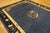 Wool Blue Antique Hand Knotted Pile Rectangle 1920s Rug, Circa Date: 1920s. This exceptional hand-knotted piece embodies...