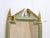 This small, painted frame has a distressed mirror with clouding and speckling. It measures 18.25"H x 11.75"W.