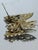 Vintage Capri butterfly brooch featuring an openwork filigree design with a lightweight, sculptural silhouette. The wings...