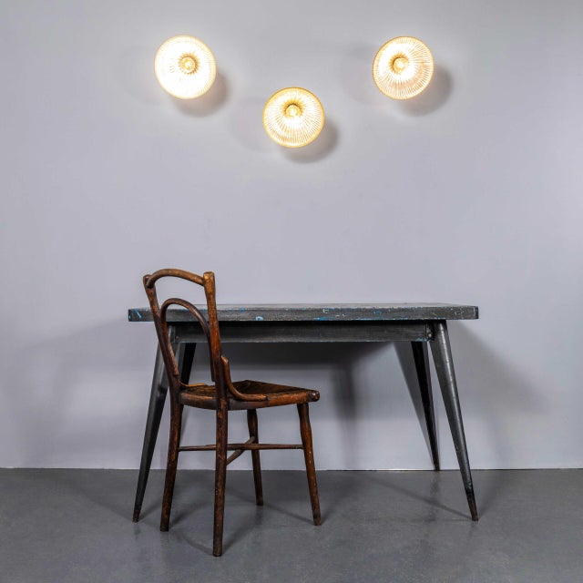 : 1940’s black holophane prismatic glass adjustable lamps. Holophane was founded in france in the late 19th century and...