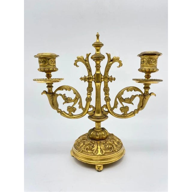 Noble neoclassical candlestick, gilded bronze, around 1900 Two-armed candlestick, solid bronze, finely chased and gilded....