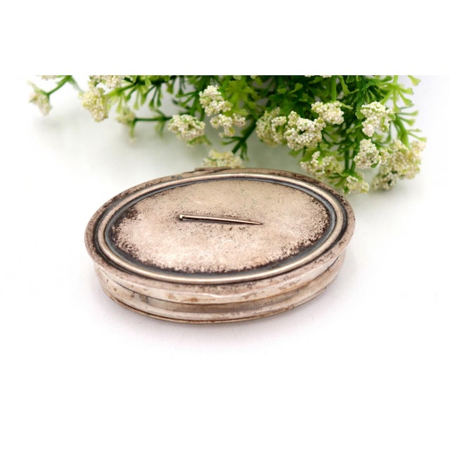 Silver Pin Box with Elliptical-Shaped Friezes and Relief, in Good conditions.