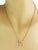 This is a beautiful authentic necklace by Louis Vuitton from the Resille Monogram collection. It is crafted from 18k...