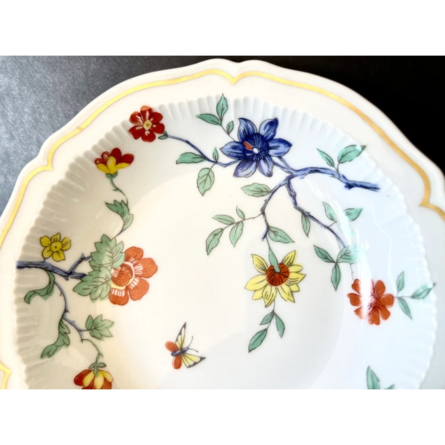 A 1958-1962 Haviland Limoges fine porcelain dessert bowl/small dish with an Asian-inspired floral pattern in red, yellow,...