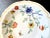 A 1958-1962 Haviland Limoges fine porcelain dessert bowl/small dish with an Asian-inspired floral pattern in red, yellow,...