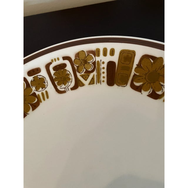 Beautiful Mid Century Modern 12" Round chop Plate Platter made in Japan. This pattern is typical of the '70's brown floral...