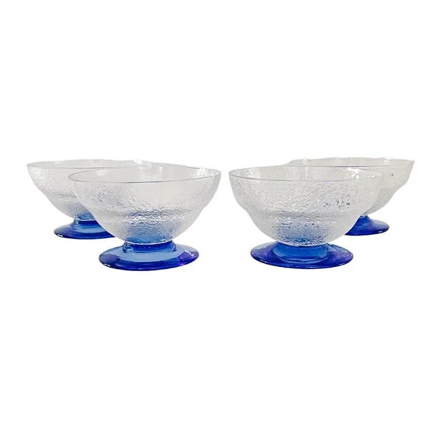 A set of four rare Daum Nancy dessert coupe glasses. Bought at antique shop in Paris over 30 years ago and original 200...