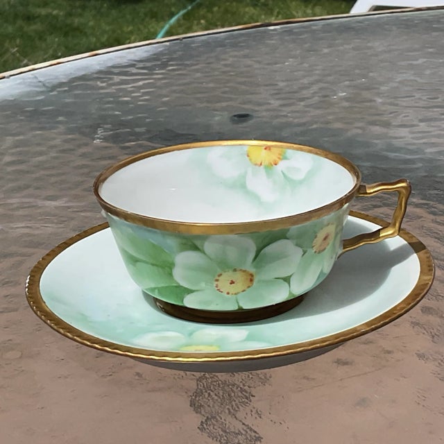 Beautiful handpainted Art Nouveau signed by the artist teacup. This teacup is like a little piece of history. It is marked...