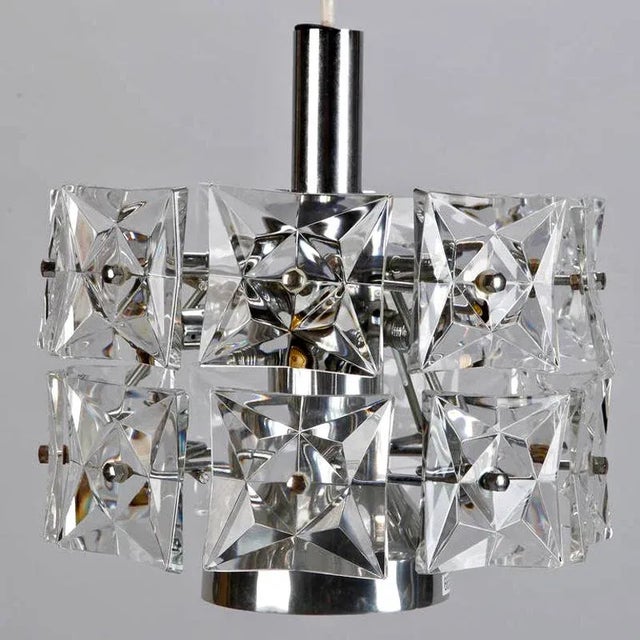 Circa 1970s hanging crystal fixture attributed to Austrian maker Kinkeldey was square faceted crystals and a chrome and...