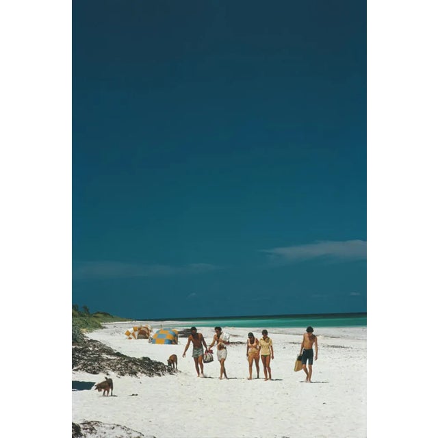 Slim Aarons, Harbour Isle Beach, Estate Stamped Photographic Print, 1973 / 2020s For Sale