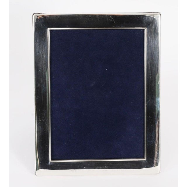 A truly superb large decorative sterling silver photo frame with makers mark RC for Carrs of Sheffield Ltd, and hallmarks...