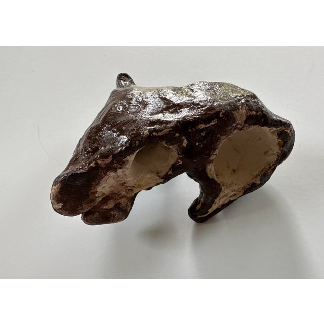 One of a kind hand crafted clay dog. Painted brown. Unsigned.