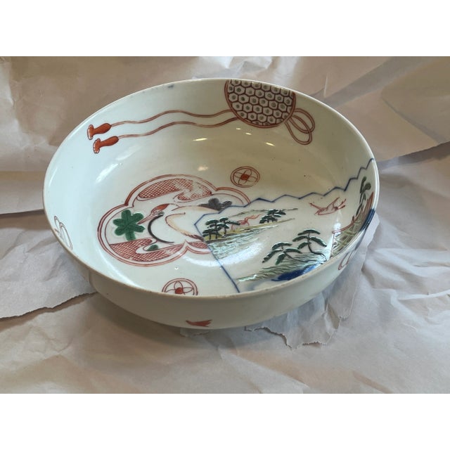 Imari palette bowl decorated in Imari colors simulating the Chinese famille verte palette (green with accents of red oxide...