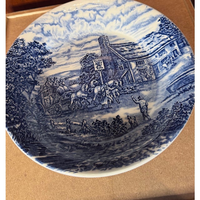 A classic English transferware bowl from Wood & Sons, featuring the charming “Post House” coaching scene in rich cobalt...