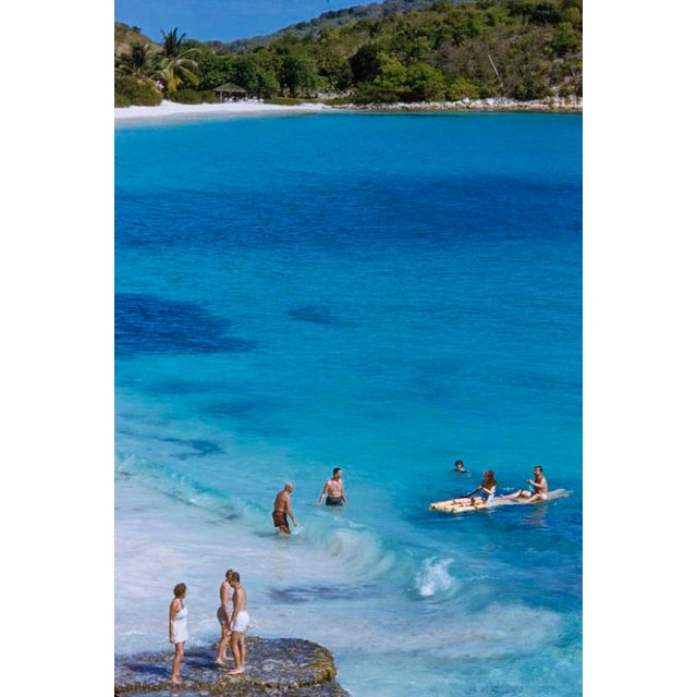 Rafting At The Mill Reef by Toni Frissell Beachgoers enjoy rafting and swimming at the Mill Reef Club, Antigua, 1959....