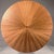 28.25" tall and 59.5" diameter, A marvelous table top produced in radial sunburst walnut with a central walnut locus to...