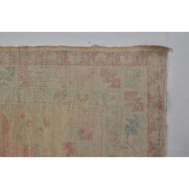 Apricot Distressed Vintage Oushak With Soft Geometric Medallion Rug For Sale - Image 8 of 10