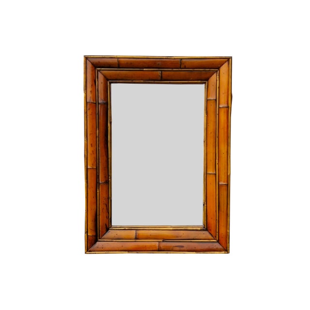 Vintage bamboo and rattan wall mirror.