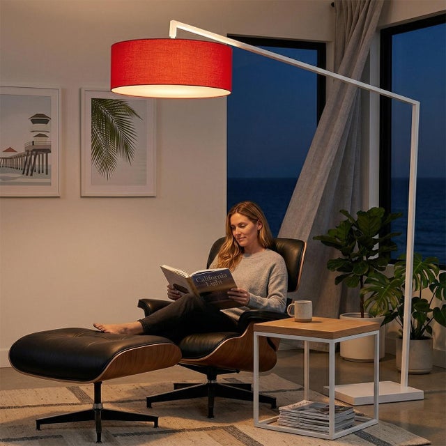 The Stretch Arc Floor Lamp is a modern lighting solution designed by Kirby Groce in 2011. This lamp features a striking...
