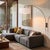 The Span Wall Mounted Arc Lamp is a Peter Morelli-designed modern lighting piece, featuring a black nickel steel body and...