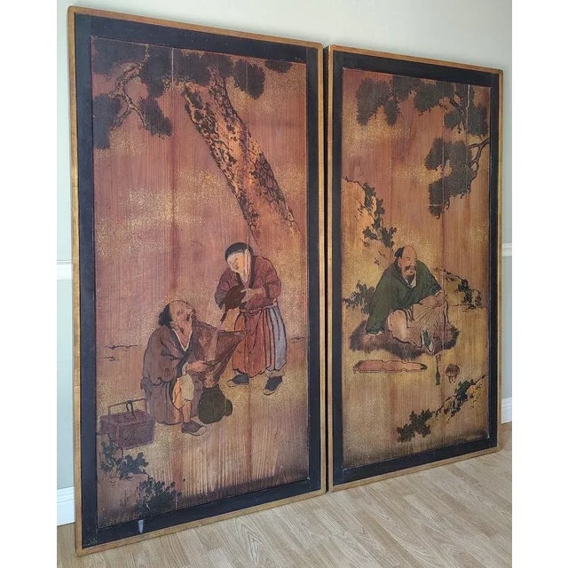 This set of antique Chinese painting on wood is a depiction of craftsmen working and socializing during the ancient times....