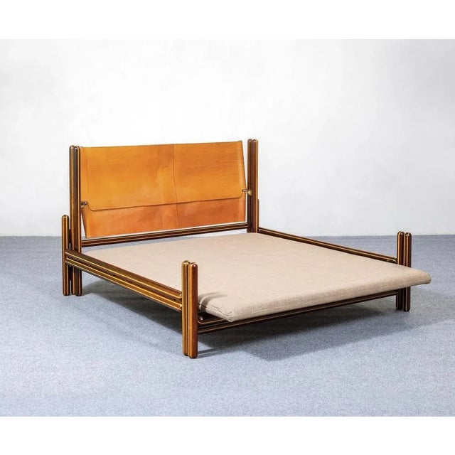 Carlo Scarpa (1906 - 1978), “Toledo” Bed, Simon Gavina, Italy, 1975. Bed with load-bearing structure in turned solid...