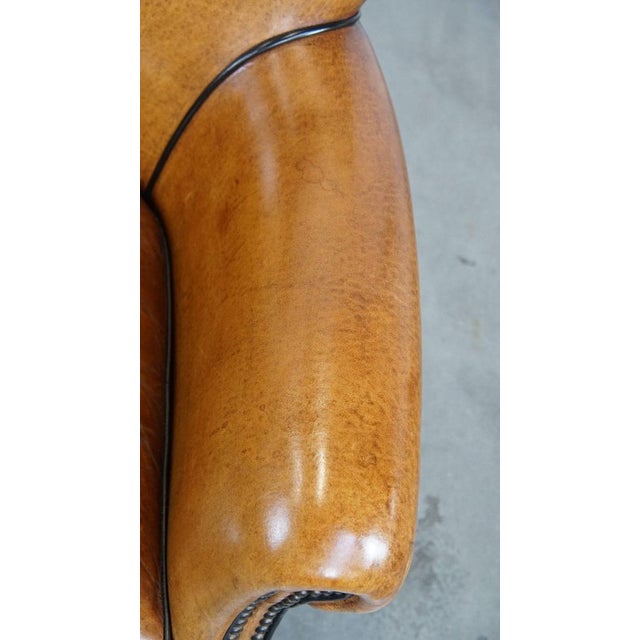Brown Leather Armchair in a Light Cognac Color For Sale - Image 8 of 12