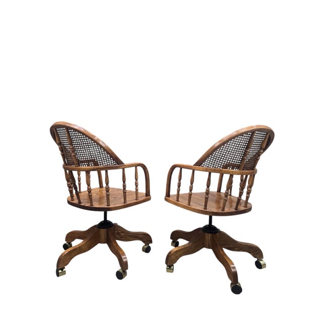 Vintage Oak Cane Back Swivel Captain’s Desk Chairs by Min-Lee for Winners Only – Pair A charming pair of vintage oak...