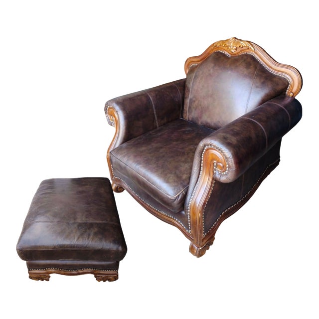 Indulge in the Rich Heritage and Exquisite Craftsmanship of the Aria Leather Chair and Ottoman Set. For Sale