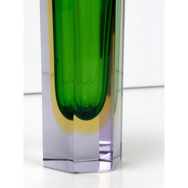 A small mid-century Murano glass sommerso vase, distinguished by its unusual combination of emerald green, golden yellow...