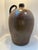 A monumental antique salt-glazed stoneware jug or flagon, dating to the 19th century and most likely of English origin....