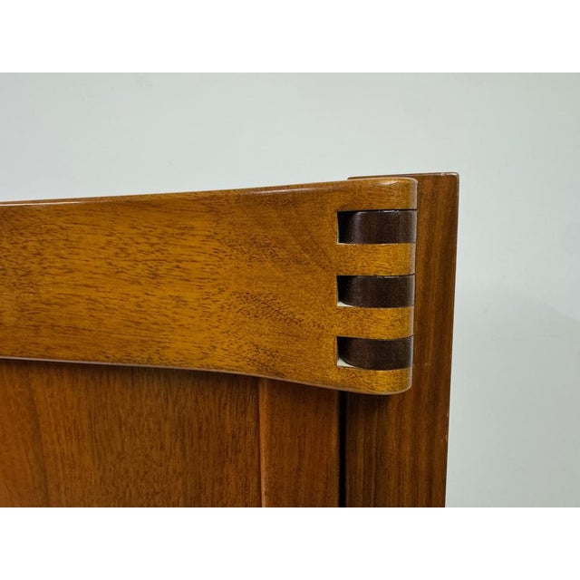 A refined mid-century cabinet attributed to Franz Xaver Sproll, showcasing the restrained elegance and exceptional...