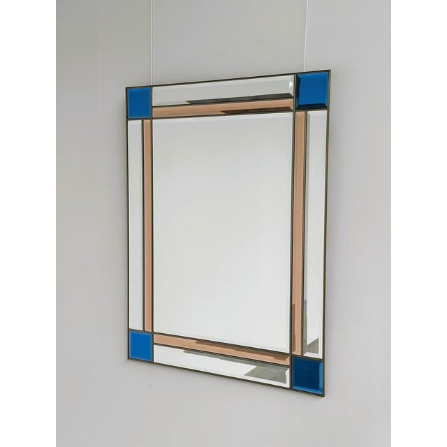 Width: 71 centimeters Height: 91 centimeters Depth: 1 centimeters Striking Italian decorative mirror from the 1980s,...