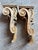 A large pair of stripped solid pine corbels dating from the late 19th century, once painted white and still retaining very...