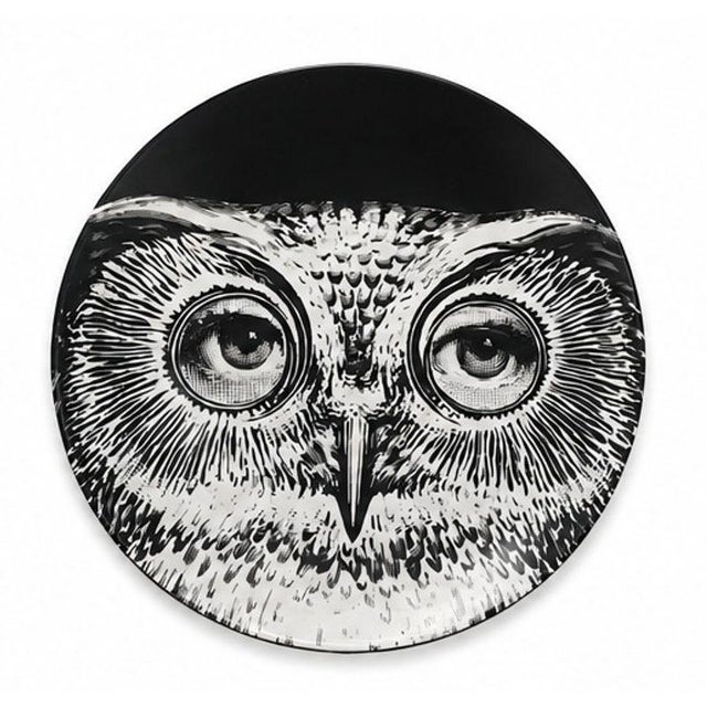 Exceptional set of eight iconic Fornasetti porcelain decorative plates featuring the celebrated Lina Cavalieri surrealist...