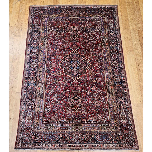 "Exquisite Early 20th Century Vintage Persian Kashan Area Rug. Hand-knotted in the early 1900s, this piece is a wonderful...