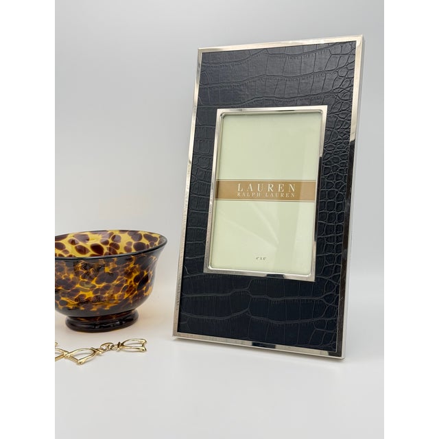 Vintage Ralph Lauren Picture Frame that holds a 4 x 6 image. Embossed black crocodile leather that sits tabletop, both...