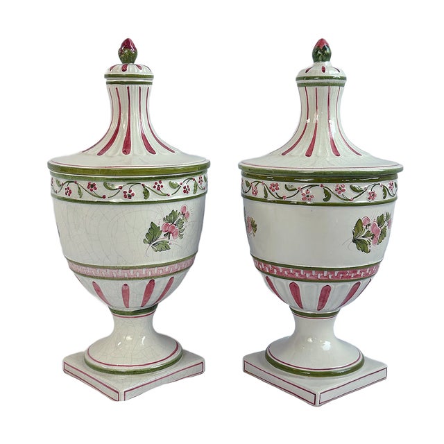 This is a pair of Italian hand-painted ceramic lidded urns by Meiselman Imports. These urns feature a softly fluted...