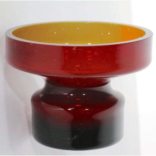 Groovy post modern cased glass vase having a red exterior, and a green interior. Well crafted, and well designed, we...
