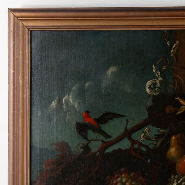 19th century Italian still life painting executed in oil on canvas. The composition features fruit, gourds, and a bird...