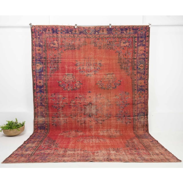 Vintage Turkish Hand-Knotted vintage rug is a semi-antique vintage Area rug.'70s Eastern region of Turkey's unique rug is...