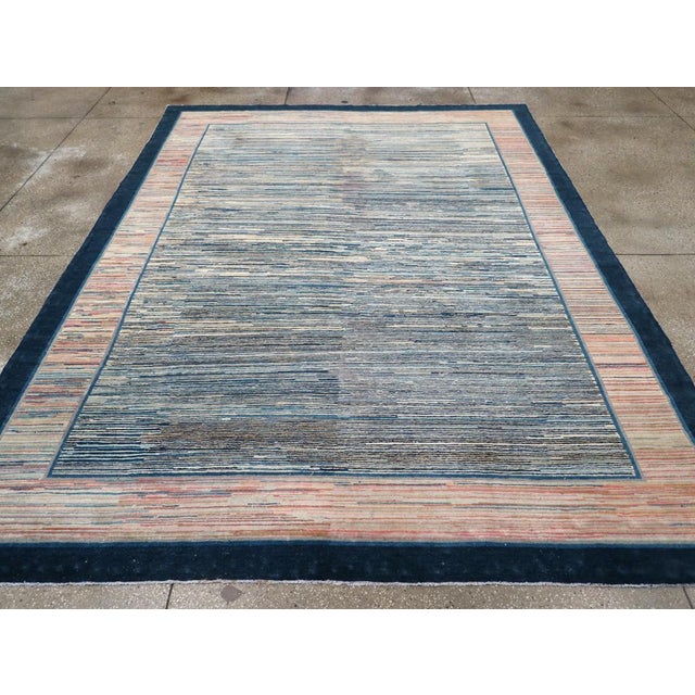 This early 20th century Chinese Peking Art Deco rug, showcases a distinctive linear design that captures the innovative...