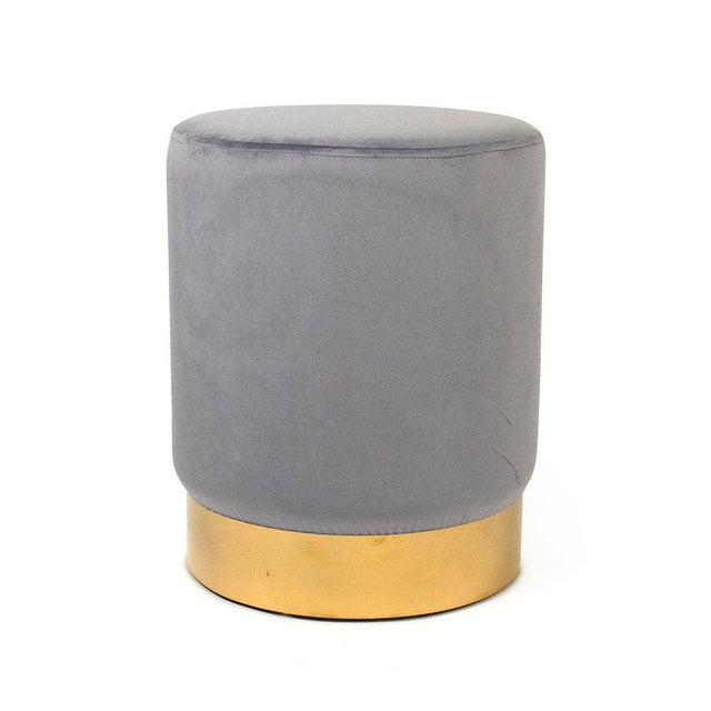 This Zentique glam accent stool features a cylindrical drum silhouette on a metallic gold band base. Compact at 14"...