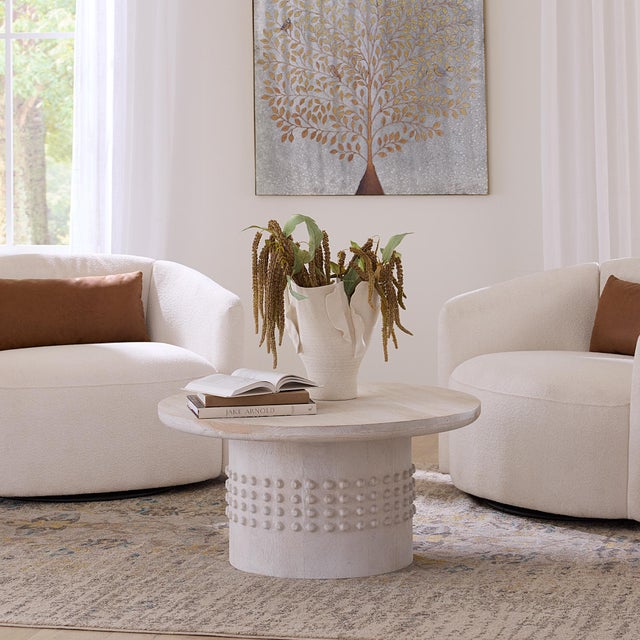 Studded Coffee Table, White Washed Wood The casual, clean finish of these sand-blasted mango wood tables lightens and...