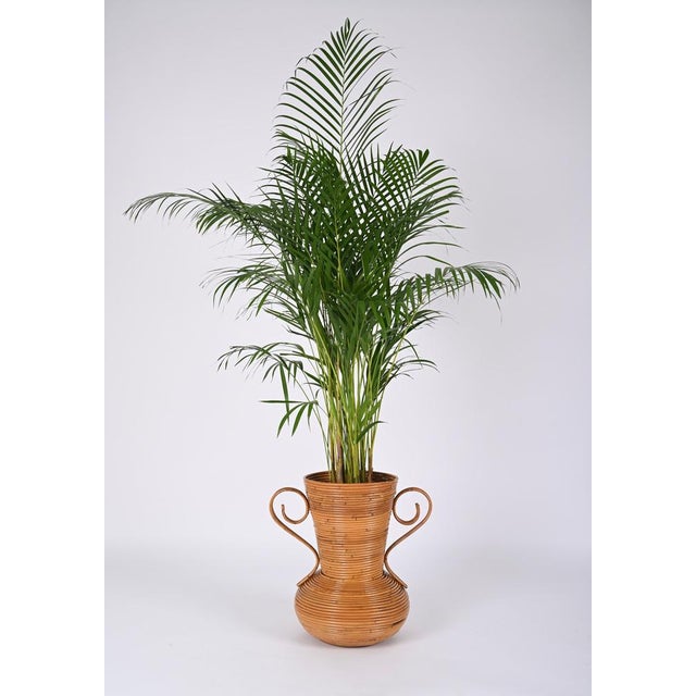 Gorgeous midcentury bamboo and rattan decorative vase. This beautiful piece was produced by Vivai del Sud in Italy during...