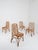 We are pleased to offer this exceptional set of four Italian Mid-Century Modern dining chairs, handcrafted in Italy circa...