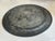 Antique pewter round tray features a beautifully timeworn surface with a deep, moody patina developed through decades of...
